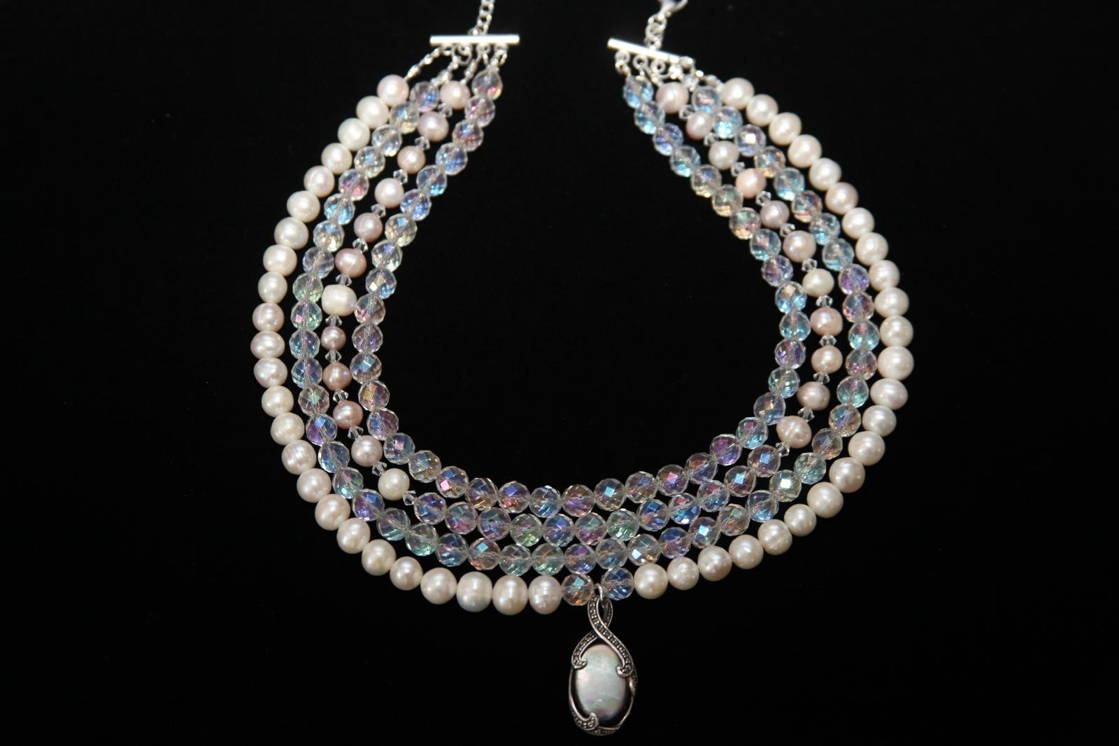 Stylish four-layered necklace with pearls and beads, featuring a silver pendant – Perles Custom Jewelry NYC