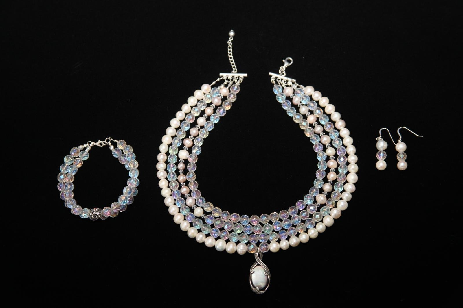 Jewelry set featuring a multi-strand necklace, a bracelet, and drop earrings, each containing pearl and crystal beads - Perles Custom Jewelry NYC
