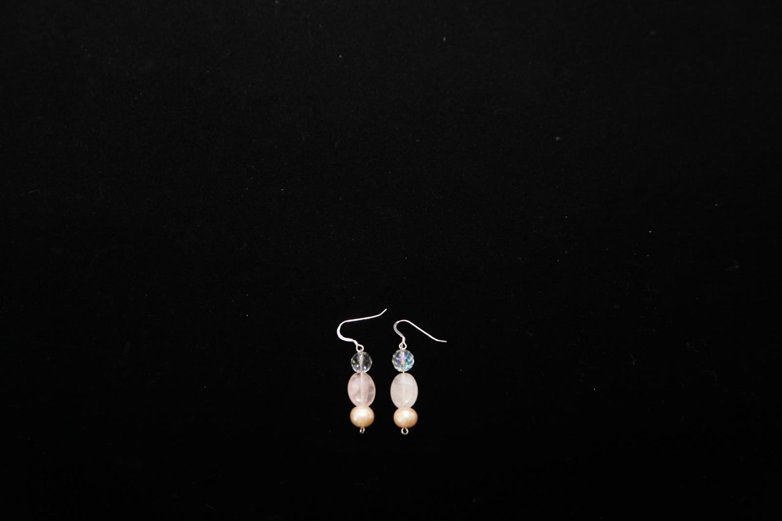 Two dangle earrings with a metal shepherd's hook, one clear glass bead, one rose quartz bead, and one pearl – Perles Custom Jewelry NYC.”
