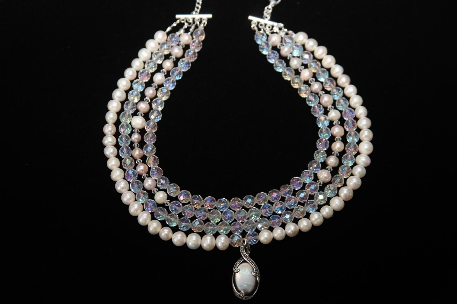 Stylish four-layered necklace with pearls and beads, featuring a silver pendant – Perles Custom Jewelry NYC